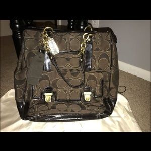 Beautiful chocolate brown with gold coach bag